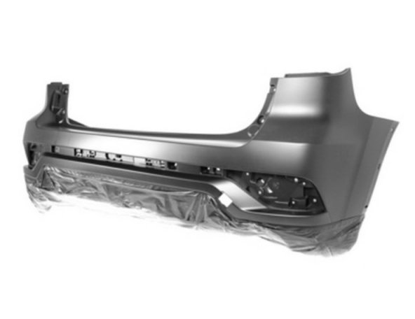 Acceder a la pieza Parachoques trasero imprimado, agujeros cerco de aleta